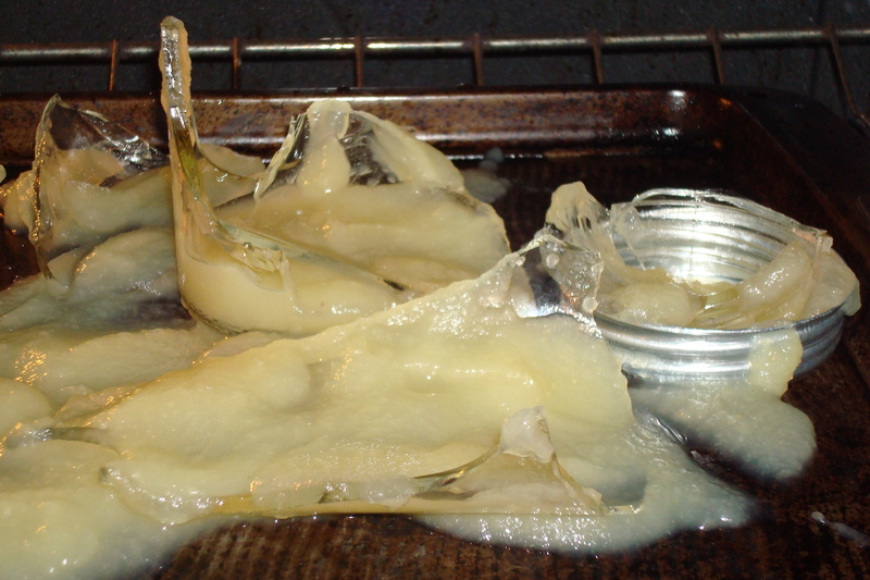 Close up of broken glass jar in oven.JPG