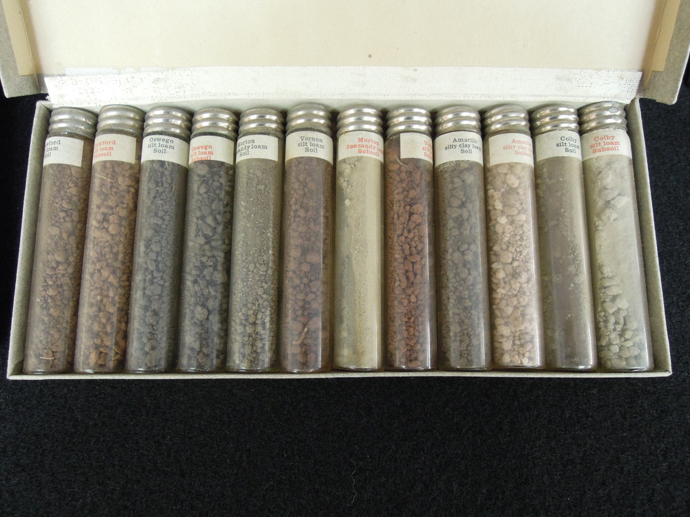 Thumbnail for the first (or only) page of Vials containing samples of soils from various geographic regions of the U.S..