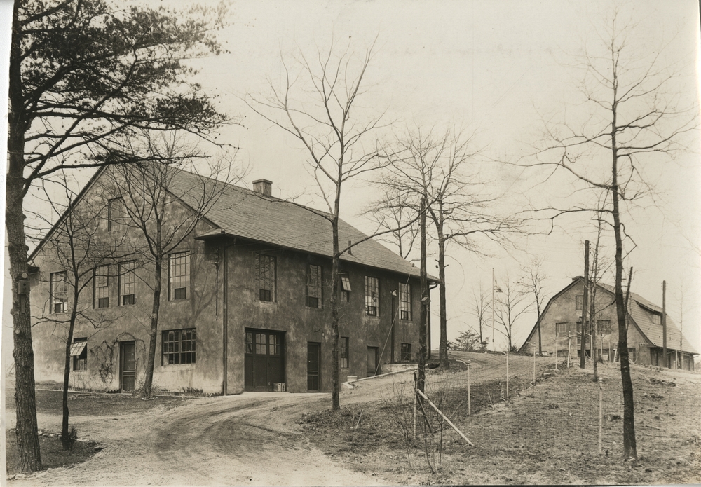 Thumbnail for the first (or only) page of First Animal Parasite Research Laboratory of the Zoological Division, Bureau of Animal Industry, at Beltsville, Maryland, with main approach road in foreground (looking northwest).