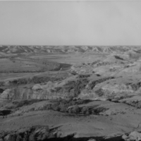 Badlands at the bridge over the Little Missouri River south of Watford City, North Dakota.