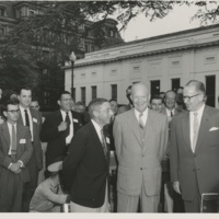 Frank Atwood of Radio Station WTIC in Hartford, Connecticut, with President Dwight Eisenhower and Secretary Ezra Taft Benson at the 1955 Spring meeting of the National Association of Television and Radio Farm Directors.