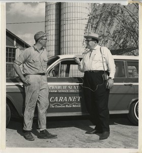 Thumbnail for the first (or only) page of Charlie Slate, Farm Service Director of the Carolina Radio Network, interviews a local farmer in the spring of 1962..