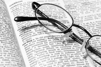 eyeglasses on a book