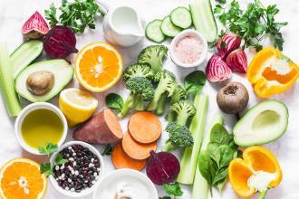 Fruits and vegetables displayed on a counter.